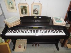 A Yamaha Clavinova electric piano & quantity of music & records