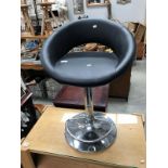 An adjustable swivel chair