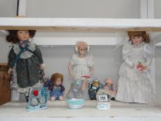 A quantity of porcelain collectors dolls