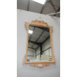 A wooden framed mirror