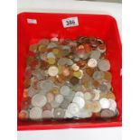 A box of mixed British and foreign coins.