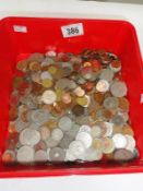 A box of mixed British and foreign coins.