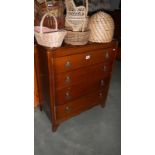 A 1930's oak ply chest of drawers