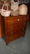 A 1930's oak ply chest of drawers