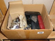 A box of various glasses, cases & lenses etc.