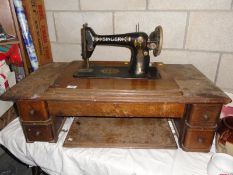 A Singer sewing table top with 4 drawers (no legs)