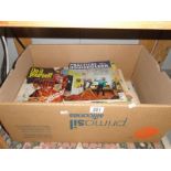 A box of DIY Practical Household magazines etc.