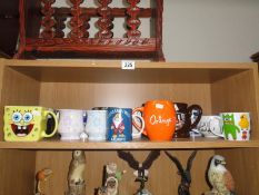 A shelf of assorted mugs