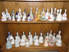 2 shelves of assorted bells