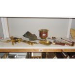 A shelf of brass & copperware