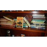 A large collection of romance fiction books, hard back & soft back - Cookson & Dickinson etc.