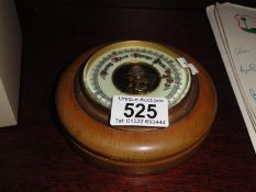 A small round barometer