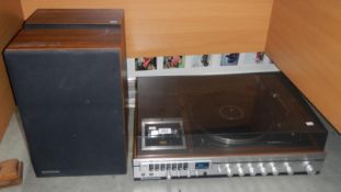 A Panasonic record player with 2 speakers