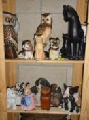 3 shelves of animal figures