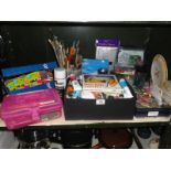 A shelf of art & craft materials