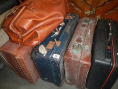 A quantity of old suitcases.