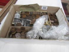 A mixed lot of coins including Victorian pennies etc.