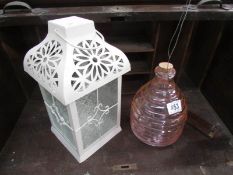 A lantern and one other item.