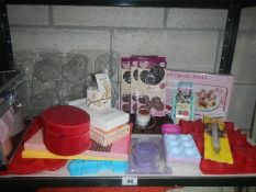 A mixed lot of kitchen ware, cake moulds etc.