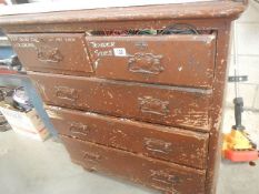 An old pine chest of drawers full of screws etc.