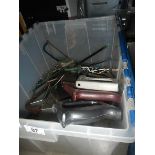 A box of saws including hack saw, tile saw, wood saws etc.