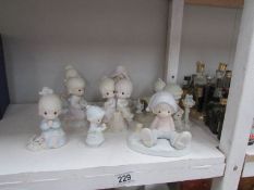 9 Precious Moments figurines,