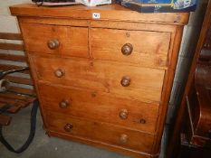 An old pine chest of drawers.