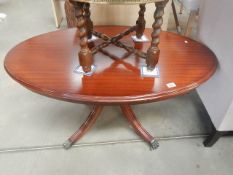 An oval occasional table.