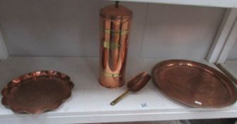 2 copper trays, a copper storage jar and a brass scoop.