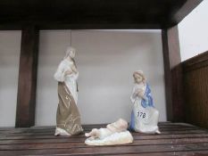 3 Cascades style figures being Mary, Joseph and the baby Jesus.