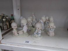 9 Precious Moments figurines.