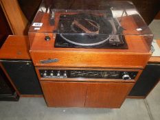 A BSR P128R stereo/radio cabinet with speakers (no stands for speakers).