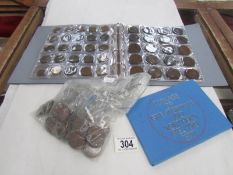 A folder of assorted coins and other loose coins etc.