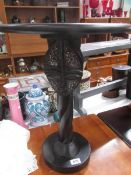 An African style occasional table.