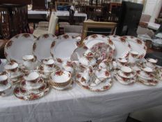 Approximately 60 pieces of Royal Albert Old Country roses tableware including teapot, cake stand,