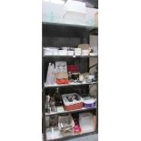 5 shelves of kitchen ware including cake board, baking tins, cooking tools, wicker baskets etc.