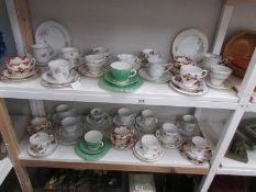 2 shelves of tea ware including Shelley, Coalport etc.