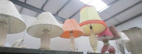 7 assorted table lamps.