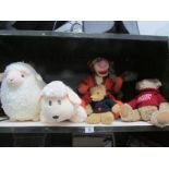 A shelf of soft toys including teddy bears, Disney's Tigger, 2 sheep etc (one is Mama's and Papa's).