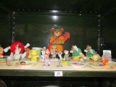 A quantity of golfing and skiing figures.