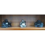 3 Buddha figures.