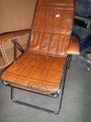 A leather effect chair.