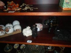 An interesting collection of elephant related items including figures, balls etc.