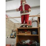 A large quantity of Christmas decorations including animatronic Santa, 3 Christmas trees,