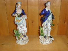 A pair of continental porcelain figures