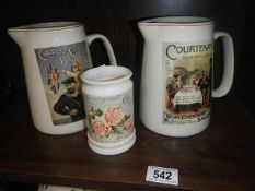 2 advertising jugs and a French floral pot.