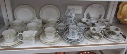 A shelf of assorted tea ware.