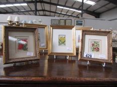 5 framed and glazed miniature embroidered pictures.