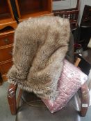 A reversible throw (still in packaging) and a faux fur throw.