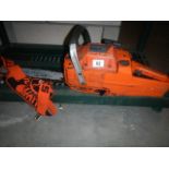 A Husguarva 257 chain saw.